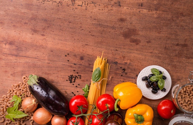 raw veggies and pasta on tabletop