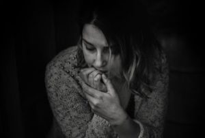 photography of woman wearing long sleeved top